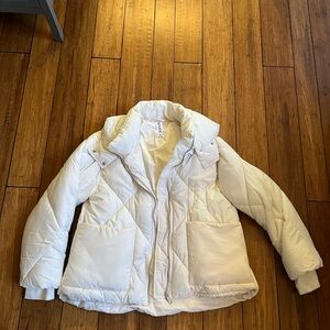 Free people Emmy swing puffer jacket in “bones” color